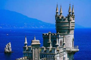 The Swallow's Nest in Crimea, Ukraine. A castle perched precariously over the Crimean Sea.
